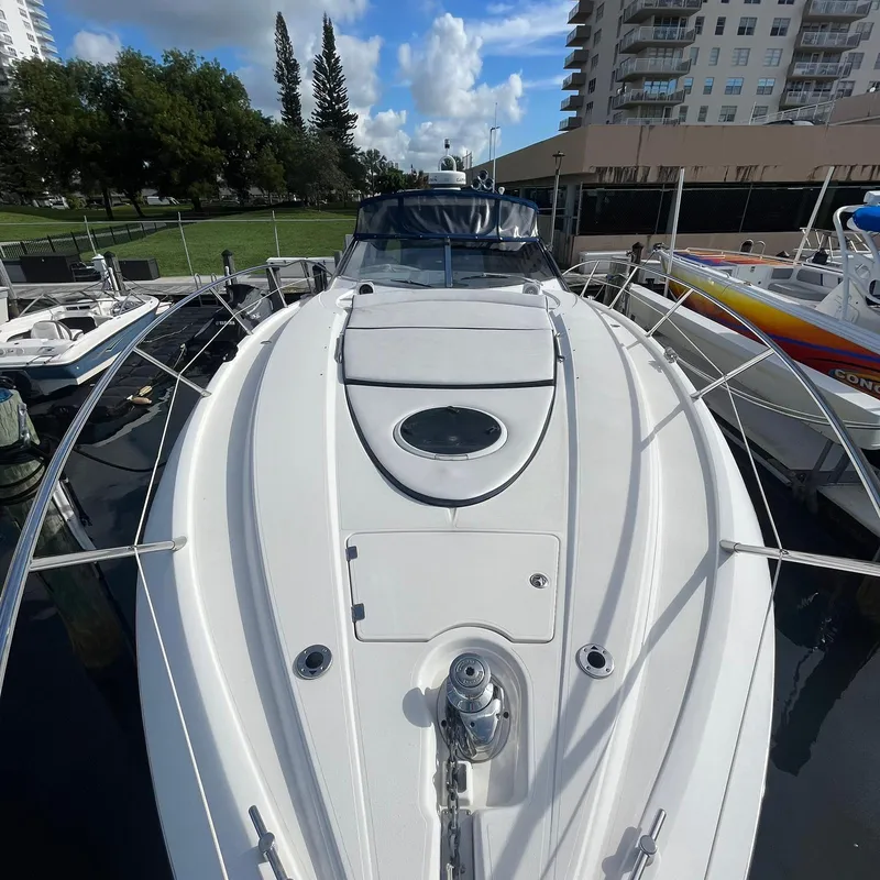 Slide: The Image of 2003 Sunseeker Portofino 46 yacht docked at marina. - 7