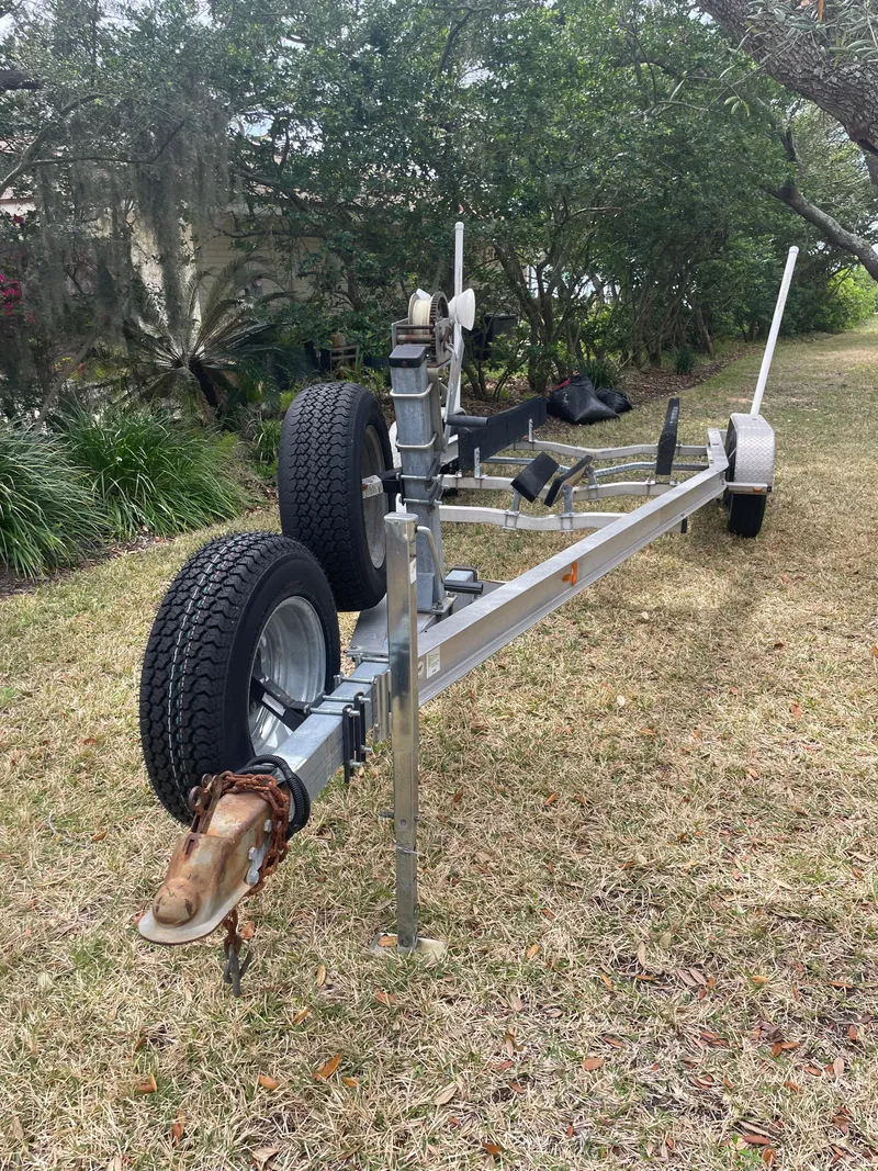 Slide: The Image of Boat trailer for 1992 Mako 221 CC on grass, side view. - 20