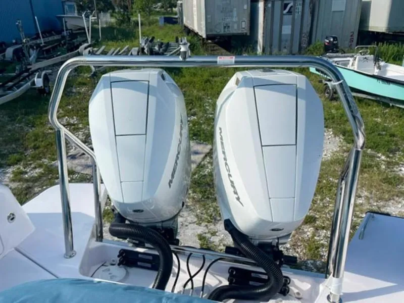 Slide: The Image of 2024 Axopar 37 Sun Top with dual Mercury outboard engines. - 3
