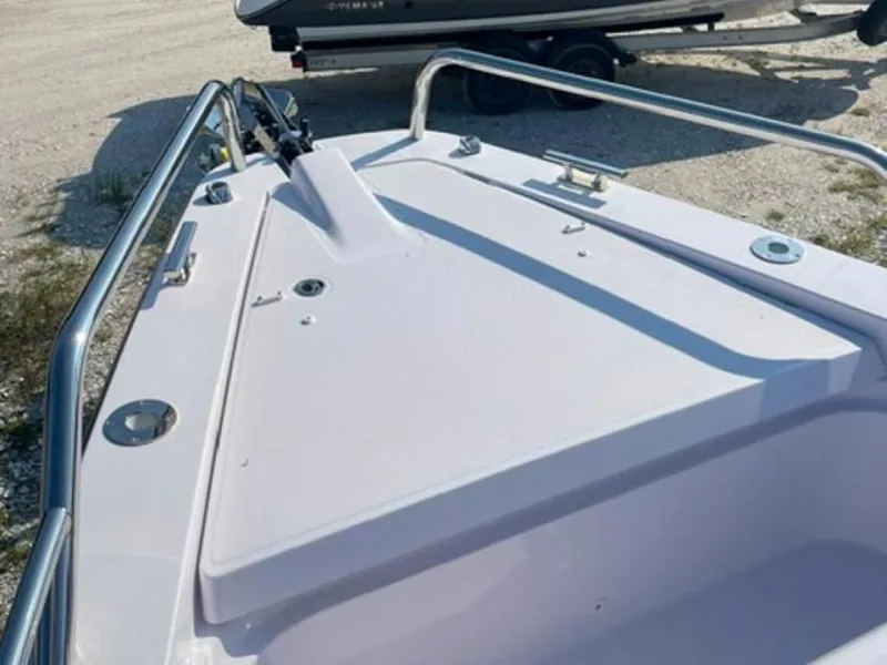 Slide: The Image of 2024 Axopar 37 Sun Top boat deck with stainless steel railings. - 9