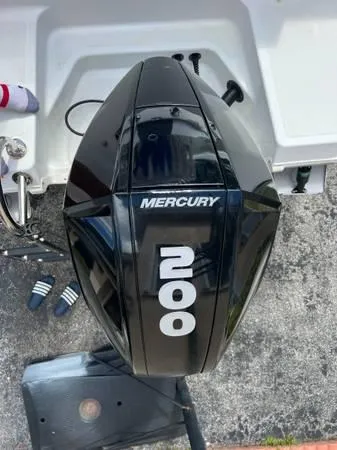 Slide: The Image of Mercury 200 outboard motor on a 2021 Wellcraft 222 Fisherman boat. - 10