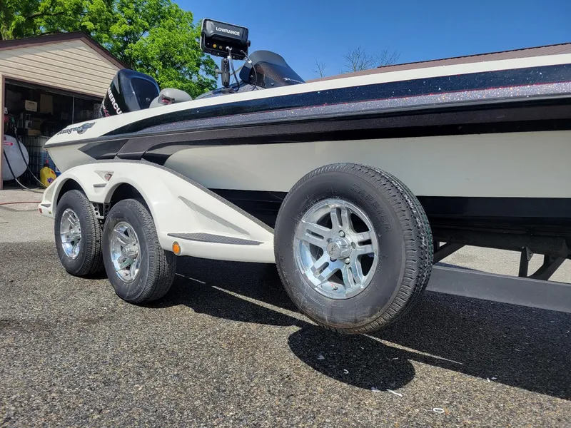 Slide: The Image of 2011 Ranger Z521 boat on trailer, featuring Mercury 250 Pro XS engine. - 11