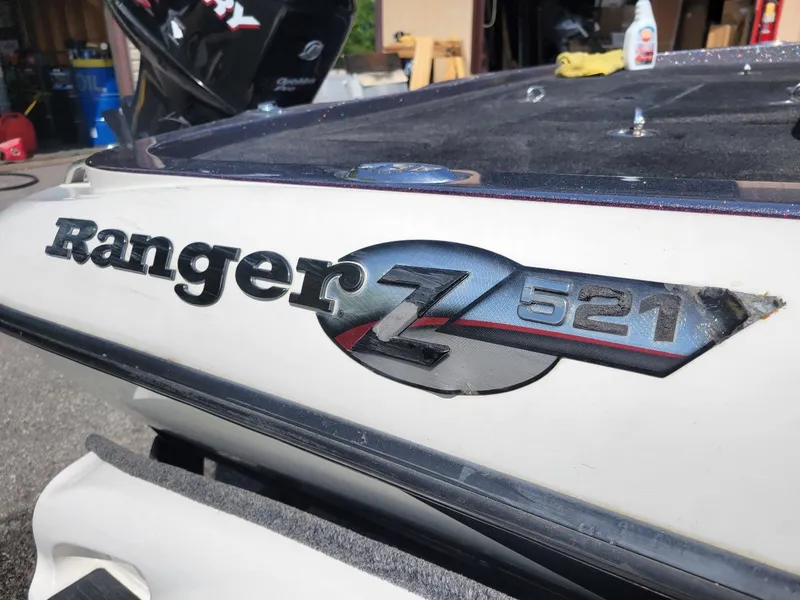 Slide: The Image of Ranger Z521 boat emblem, close-up view, showcasing model details and branding. - 3