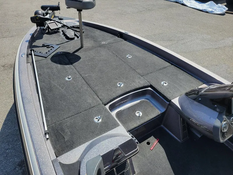 Slide: The Image of 2011 Ranger Z521 boat deck with seating and control panel, featuring Mercury 250 Pro XS. - 5