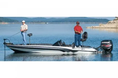 Slide: The Image of Two people fishing on a 2011 Ranger Z521 boat in a serene lake. - 8