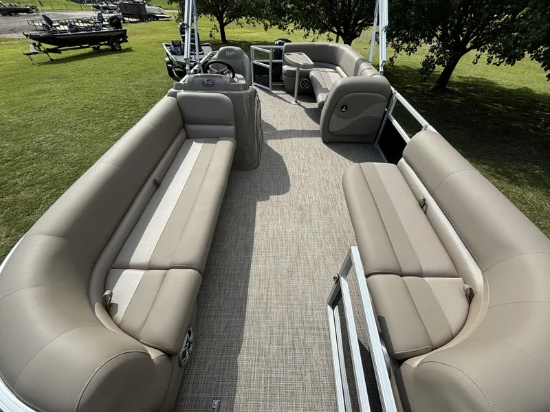 Slide: The Image of 2024 Ranger 200C pontoon boat with spacious seating and modern design. - 6