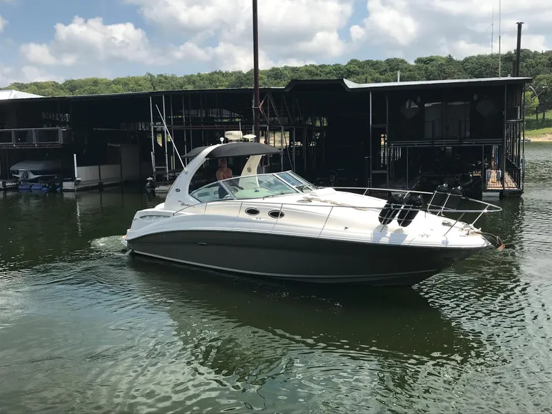 Slide: The Image of 2007 Sea Ray 320 Sundancer boat docked on a sunny day. - 5