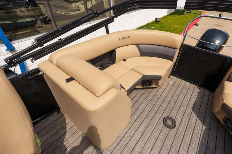 Slide: The Image of Luxurious seating on 2022 Harris 230 CRUISER pontoon boat with tan upholstery. - 15