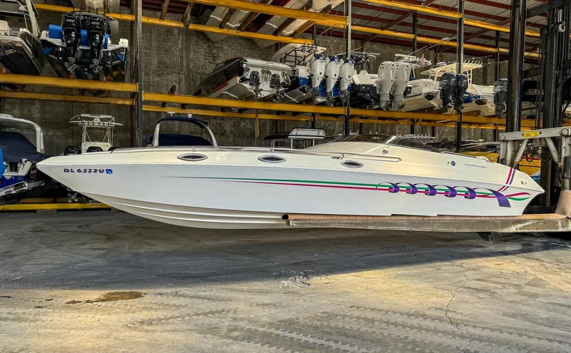 Slide: The Image of 1998 Eliminator 280 Eagle XP speedboat in storage facility. - 2