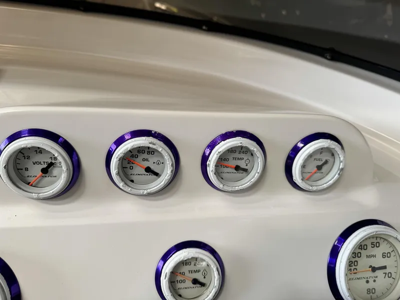 Slide: The Image of Close-up of 1998 Eliminator 280 Eagle XP boat dashboard gauges. - 28