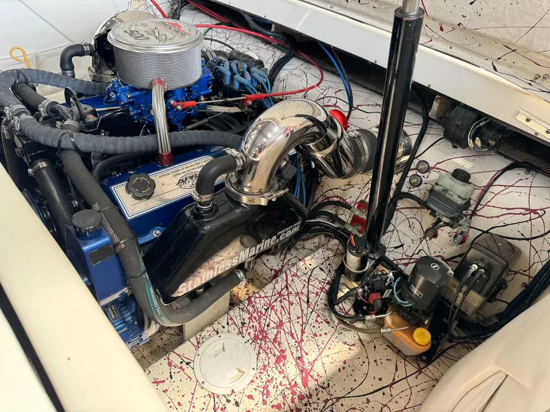 Slide: The Image of 1998 Eliminator 280 Eagle XP engine compartment with detailed components. - 36