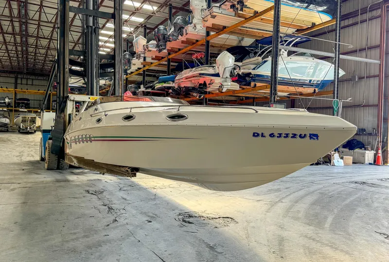 Slide: The Image of 1998 Eliminator 280 Eagle XP boat in indoor storage facility - 4