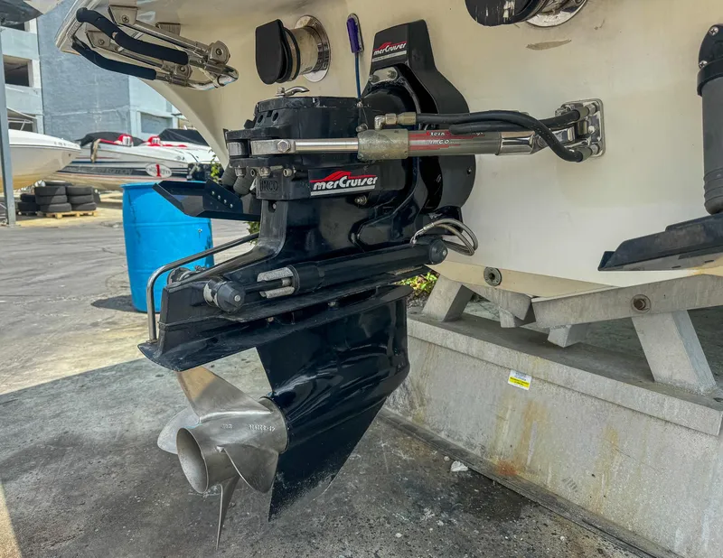 Slide: The Image of 1998 Eliminator 280 Eagle XP boat with MerCruiser outdrive on trailer. - 46