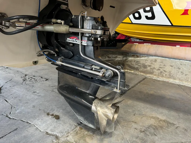 Slide: The Image of Close-up of 1998 Eliminator 280 Eagle XP MerCruiser stern drive. - 9