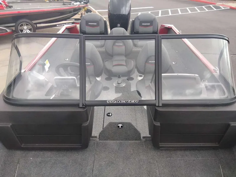 Slide: The Image of 2024 Tracker Pro Guide V-175 Combo boat interior with seating and windshield. - 3
