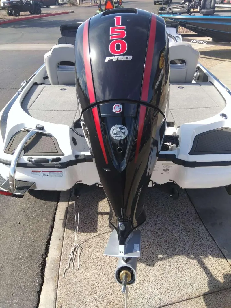 Slide: The Image of 2024 Nitro Z18 Pro boat with a 150 Pro outboard motor. - 3