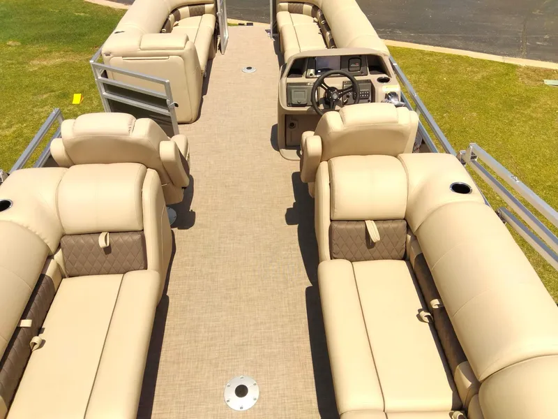 Slide: The Image of 2024 Sun Tracker Party Barge 24 DLX with spacious seating and modern helm. - 6