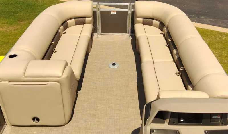 Slide: The Image of 2024 Sun Tracker Party Barge 24 DLX with spacious seating and beige upholstery. - 7
