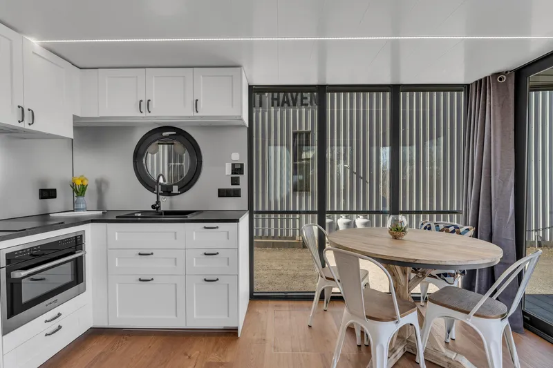 Slide: The Image of Modern kitchen and dining area in 2024 Waterlodge Apart EL. - 19