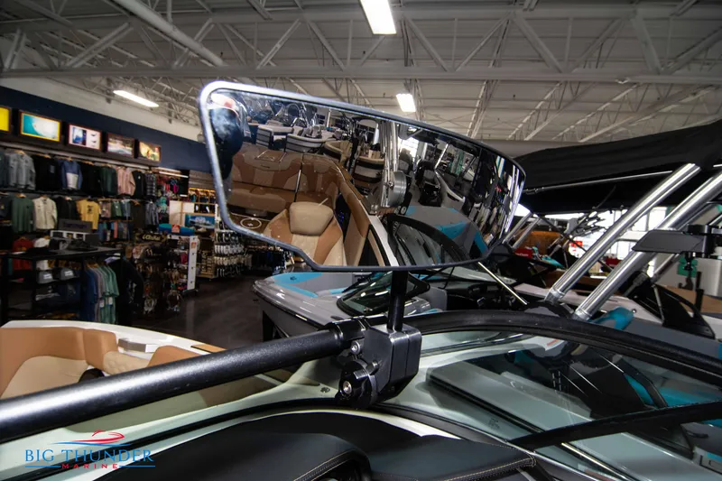 Slide: The Image of 2024 MasterCraft XT24 boat rearview mirror in showroom. - 35