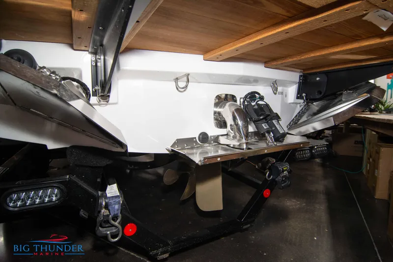 Slide: The Image of 2024 MasterCraft XT24 boat stern with propeller and underwater gear. - 6
