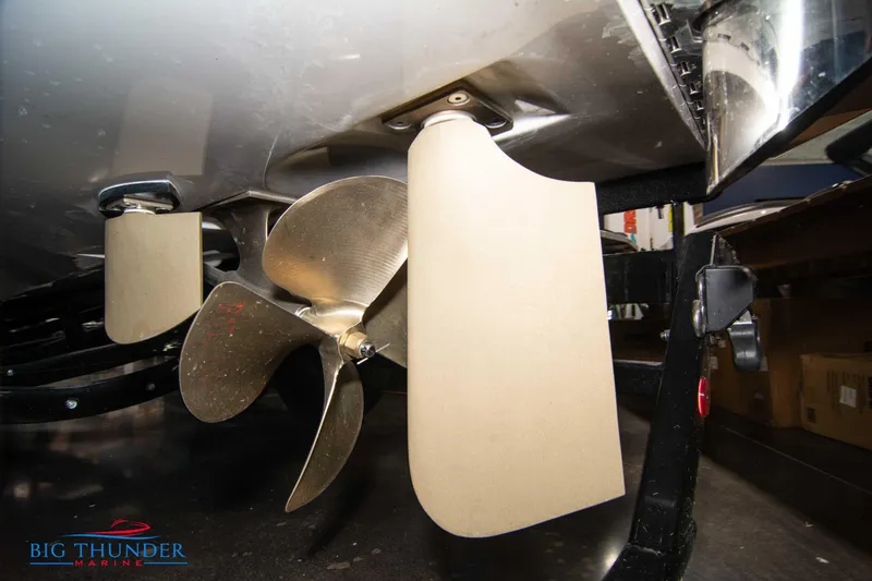 Slide: The Image of 2024 MasterCraft XT24 boat propeller and rudder system at Big Thunder Marine. - 7