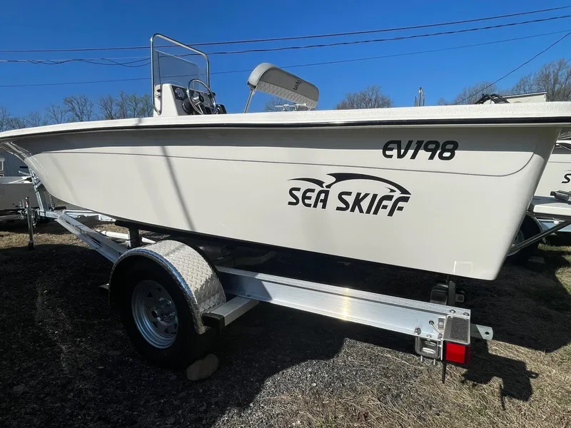 The Image of 2024 Carolina Skiff EV 198 Sea Skiff on trailer, side view. - 0