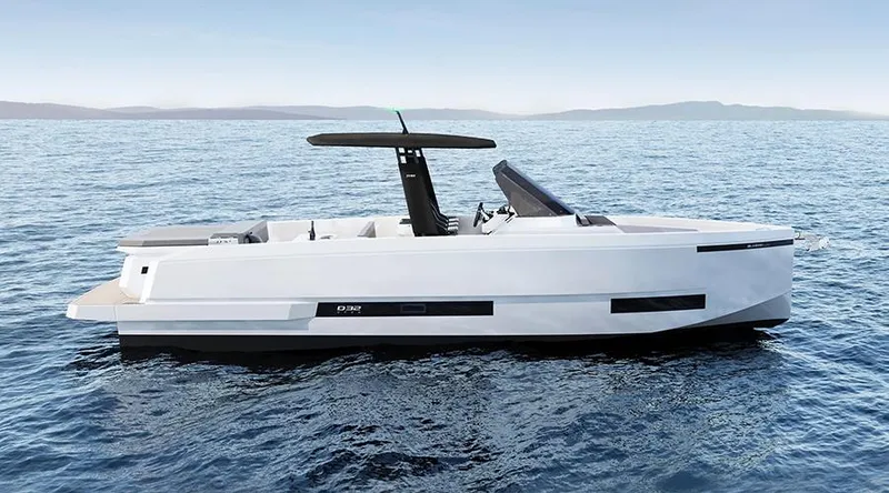 Slide: The Image of 2024 De Antonio Yachts D32 OPEN bow with anchor, sleek design on calm water. - 4