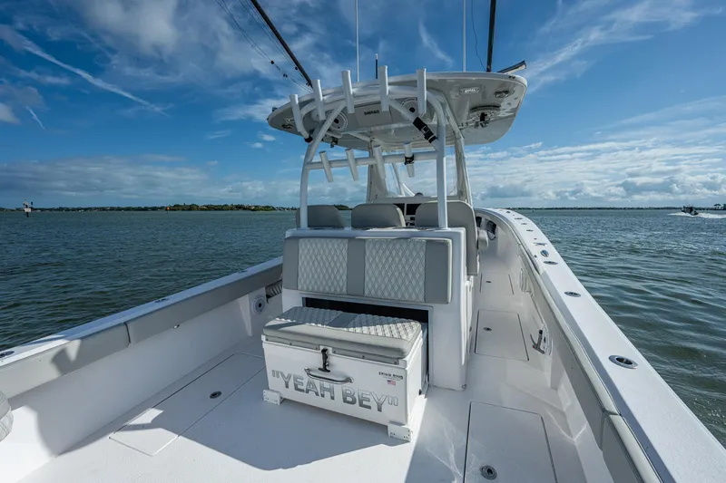 Slide: The Image of 2021 Front Runner 36 Center Console boat on open water. - 17