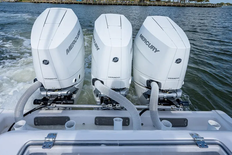 Slide: The Image of 2021 Front Runner 36 Center Console with triple Mercury outboard engines. - 20