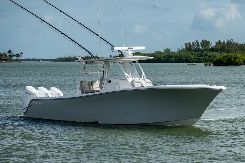 Slide: The Image of 2021 Front Runner 36 Center Console boat cruising on water. - 22