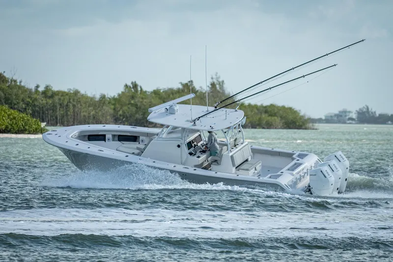 Slide: The Image of 2021 Front Runner 36 Center Console boat cruising on water. - 26