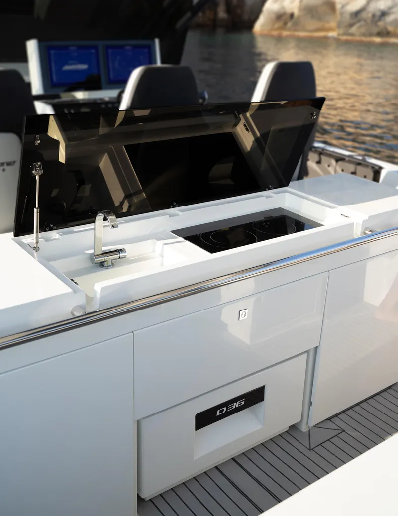 Slide: The Image of 2025 De Antonio Yachts D36 OPEN with sleek outdoor kitchen and modern design. - 6