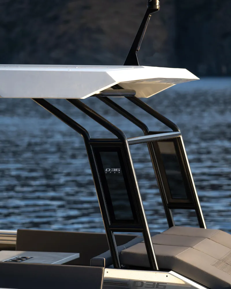 Slide: The Image of 2025 De Antonio Yachts D36 OPEN, sleek design, modern structure, on calm water. - 8