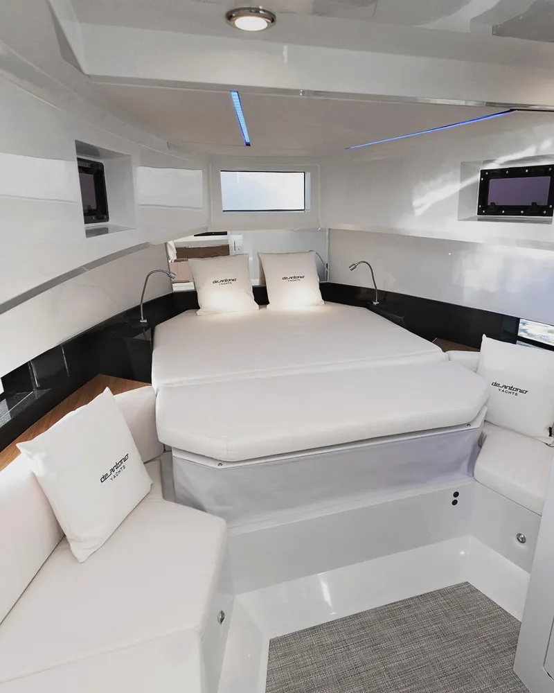 Slide: The Image of 2025 De Antonio Yachts D36 OPEN cabin interior with modern design and comfortable bedding. - 9