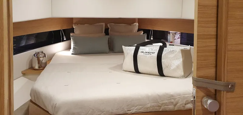 Slide: The Image of Luxurious cabin interior of 2024 De Antonio Yachts D42 Open with cozy bedding and stylish decor. - 17