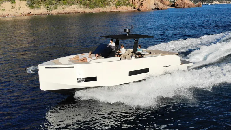 Slide: The Image of 2024 De Antonio Yachts D42 Open cruising on water, showcasing sleek design and luxury features. - 6