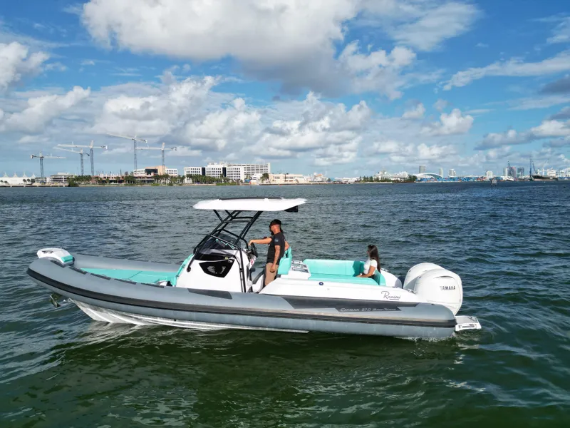 Slide: The Image of 2025 Ranieri CAYMAN 27.0 SPORT TOURING boat cruising on a sunny day. - 8