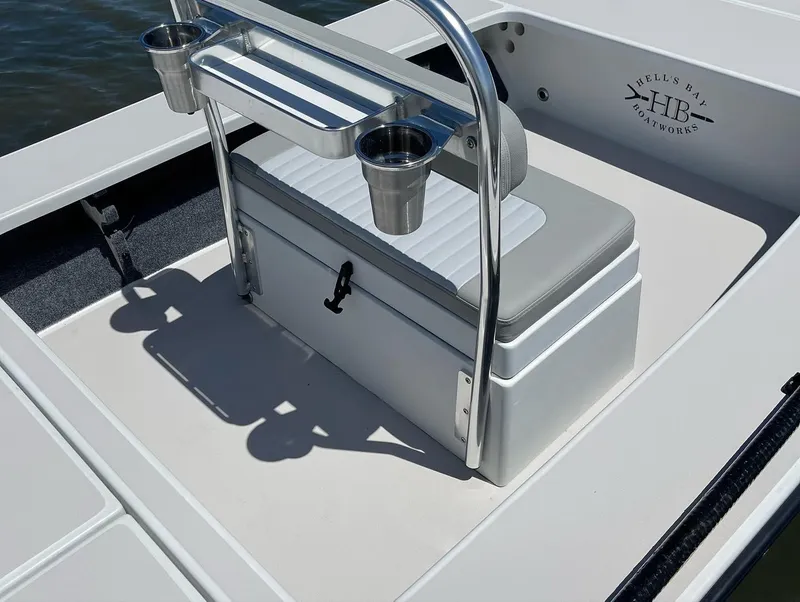 Slide: The Image of 2009 Hell's Bay WATERMAN boat interior with seating and cup holders. - 3