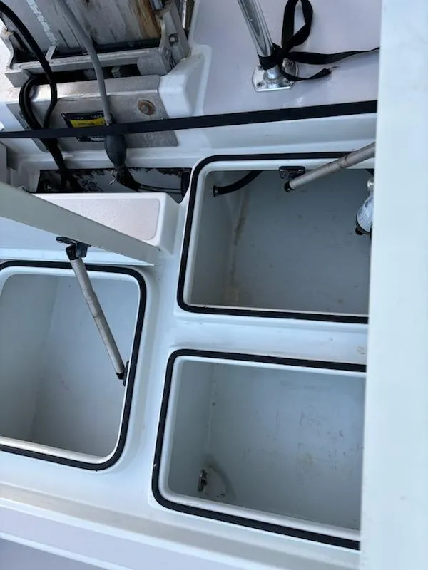 Slide: The Image of 2009 Hell's Bay WATERMAN boat storage compartments and hydraulic systems. - 4