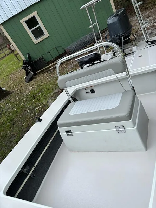 Slide: The Image of 2009 Hell's Bay WATERMAN boat interior with seating and storage. - 7