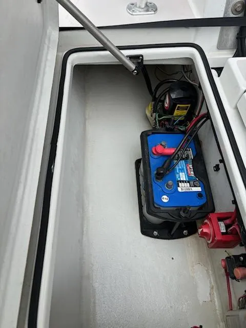 Slide: The Image of 2009 Hell's Bay WATERMAN boat battery compartment with wiring and components. - 8