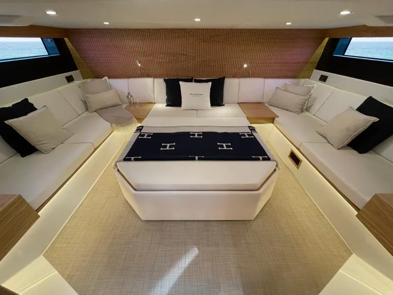 Slide: The Image of Luxurious interior of 2024 De Antonio Yachts D50 OPEN with elegant seating and modern design. - 12