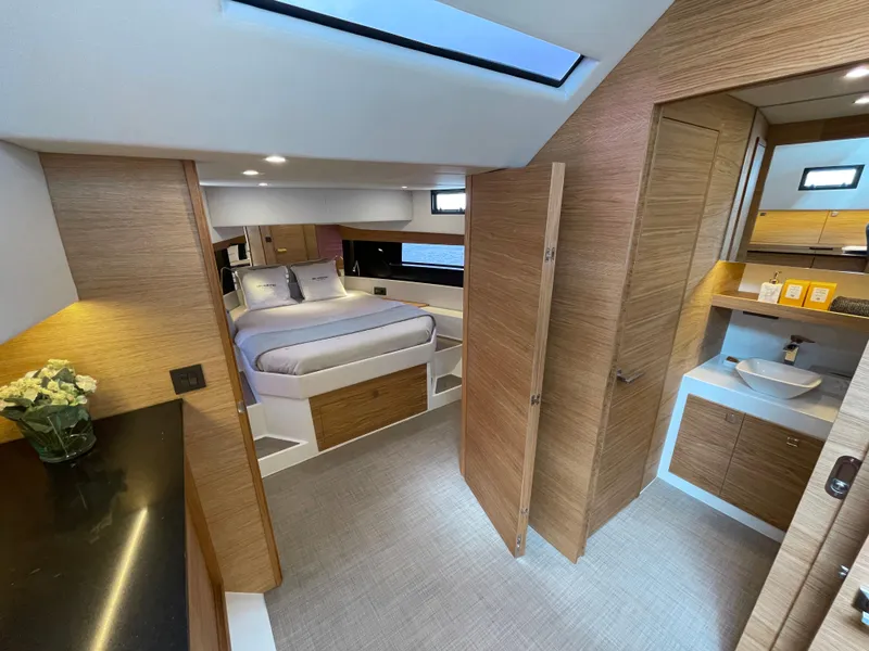 Slide: The Image of Luxurious interior of 2024 De Antonio Yachts D50 OPEN, featuring modern bedroom and bathroom. - 13