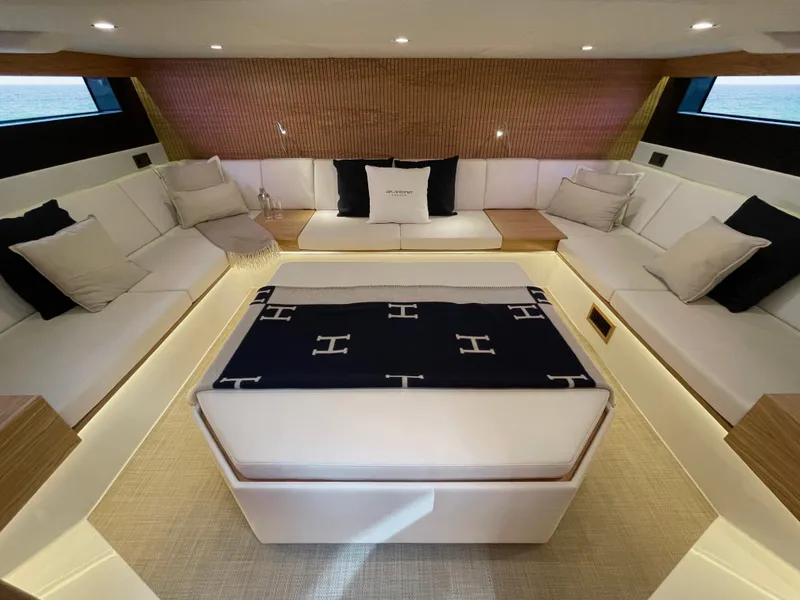 Slide: The Image of Luxurious interior of 2024 De Antonio Yachts D50 OPEN with elegant seating and modern design. - 14