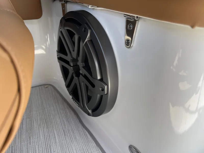 Slide: The Image of 2023 Four Winns H4 boat interior speaker and seating detail. - 23