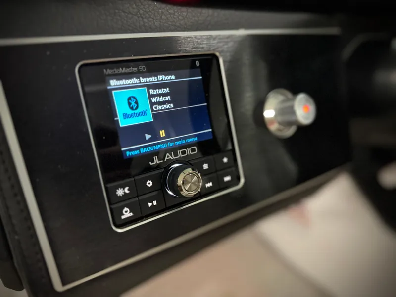 Slide: The Image of JL Audio system in 2023 Four Winns H4 boat, displaying Bluetooth connection. - 31