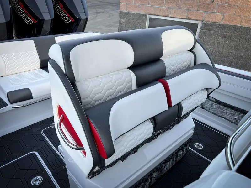 Slide: The Image of 2025 Nor-Tech 390 Sport boat interior with stylish seating and modern design. - 10