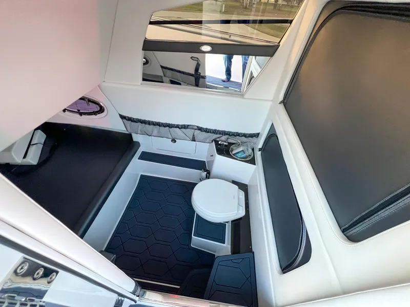 Slide: The Image of 2025 Nor-Tech 390 Sport cabin interior with modern amenities and sleek design. - 20