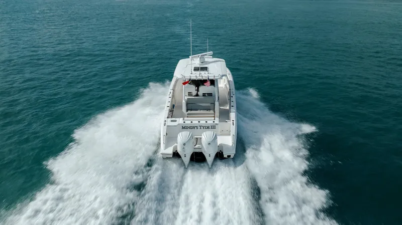 Slide: The Image of 2022 Pursuit S 328 boat cruising on open water. - 13
